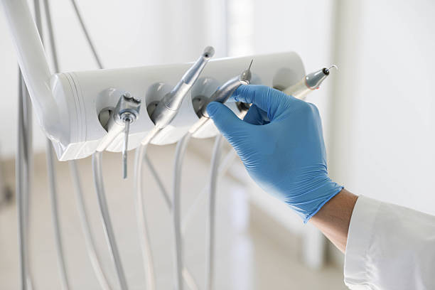 Professional Tooth Extraction technician working in Urania, LA